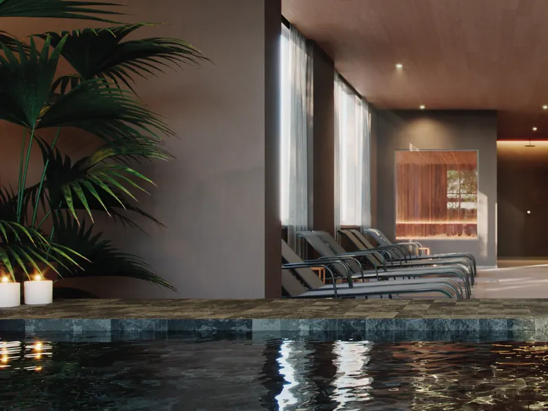 Spa com banheira do Grand Quartier Rio2 com espreguiçadeiras e jardim