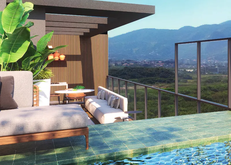 Terraço de cobertura linear do Grand Quartier Rio2 com piscina privativa e vista para o maciço da Pedra Branca